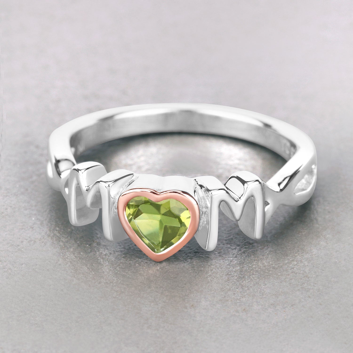 Anillo de plata de ley .925 con peridoto genuino de 0.44 quilates