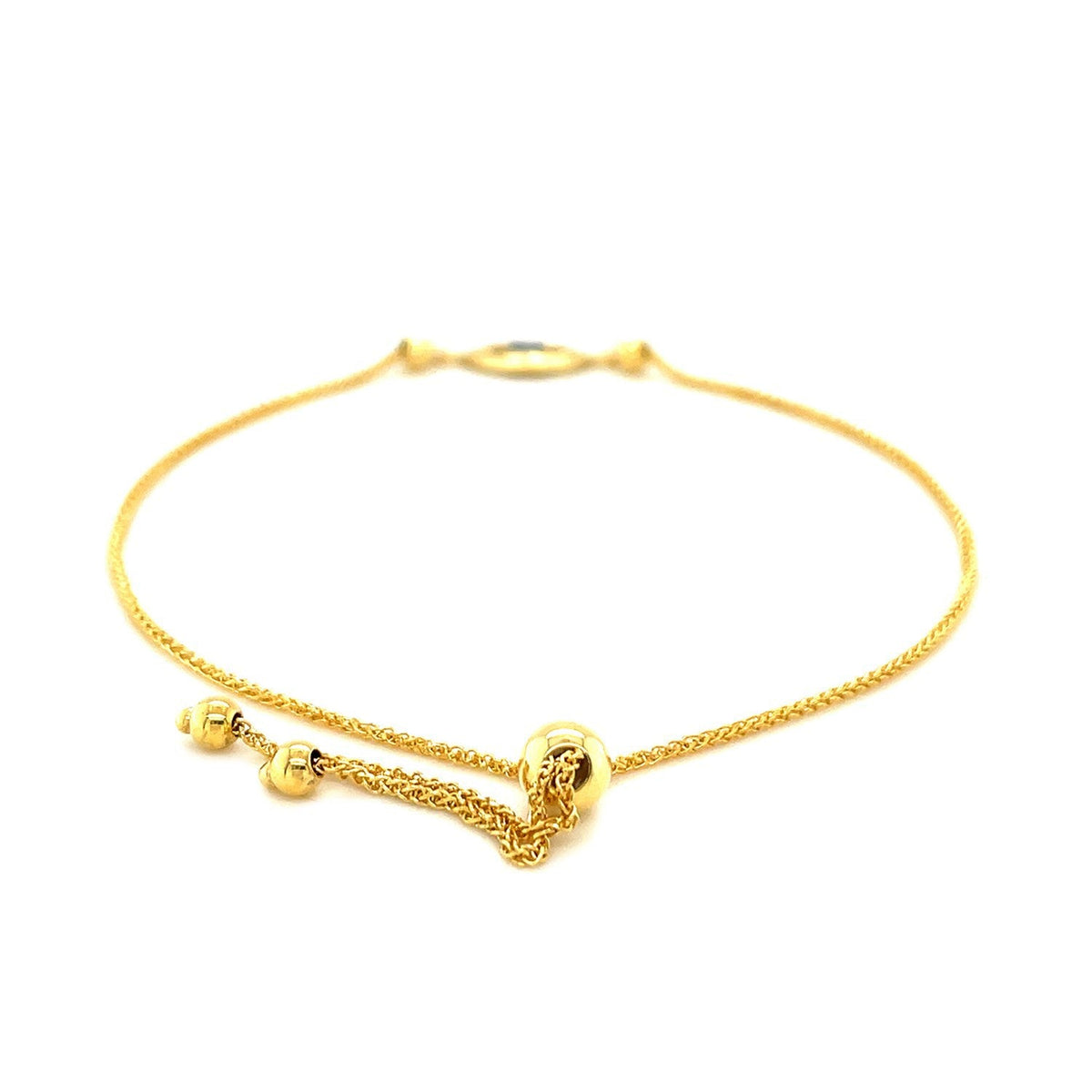 Pulsera de oro amarillo de 14k con ojo turco ajustable