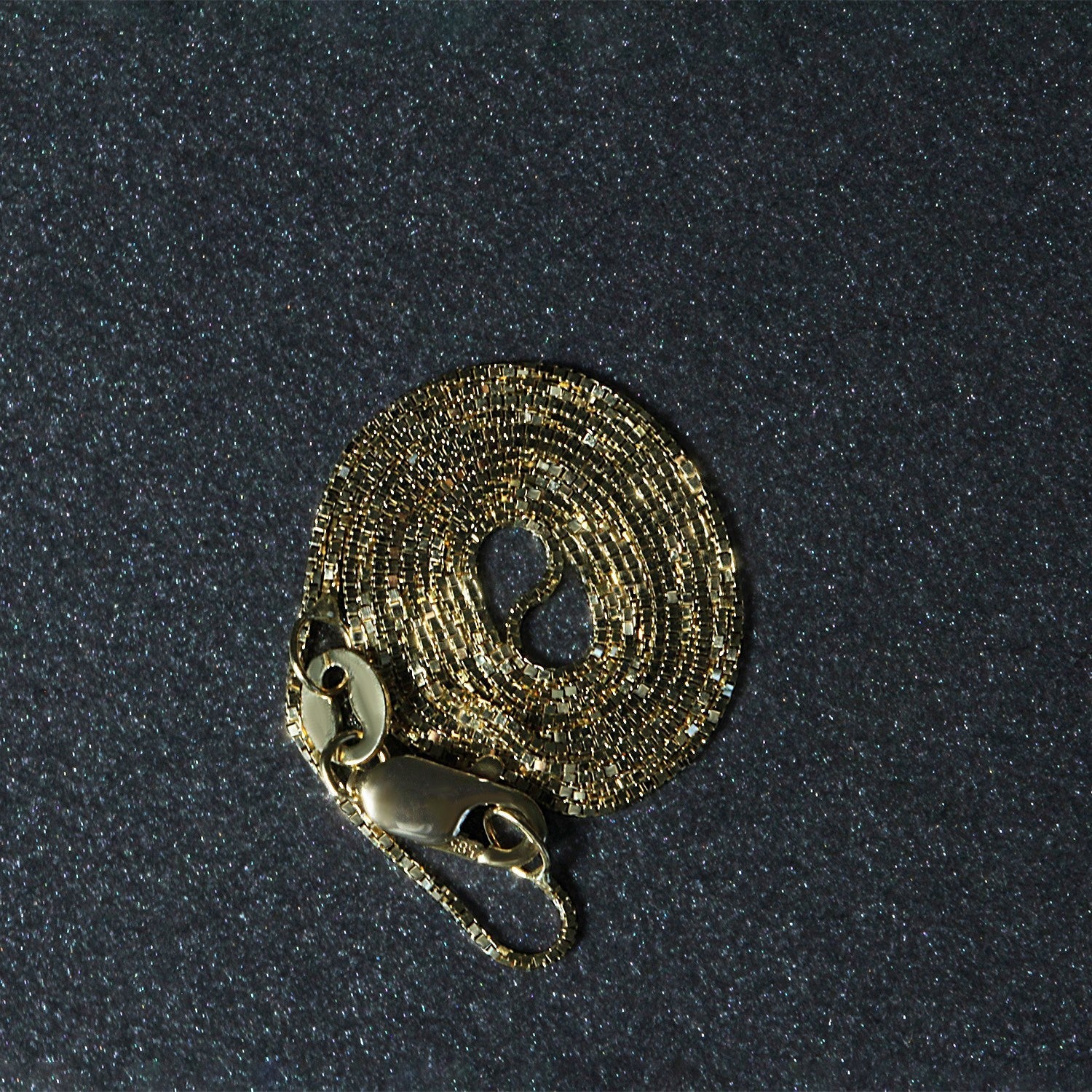 Cadena clásica de oro amarillo de 14k y 0.6mm