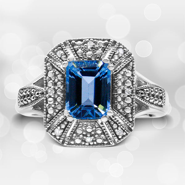 Anillo de plata de ley .925 con detalles de diamantes y topacio azul talla esmeralda de 8x6 mm (color I-J, claridad I2-I3) - Talla de anillo 7