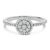 Anillo de halo con motivo redondo de diamante de 1/5 Cttw de plata de ley