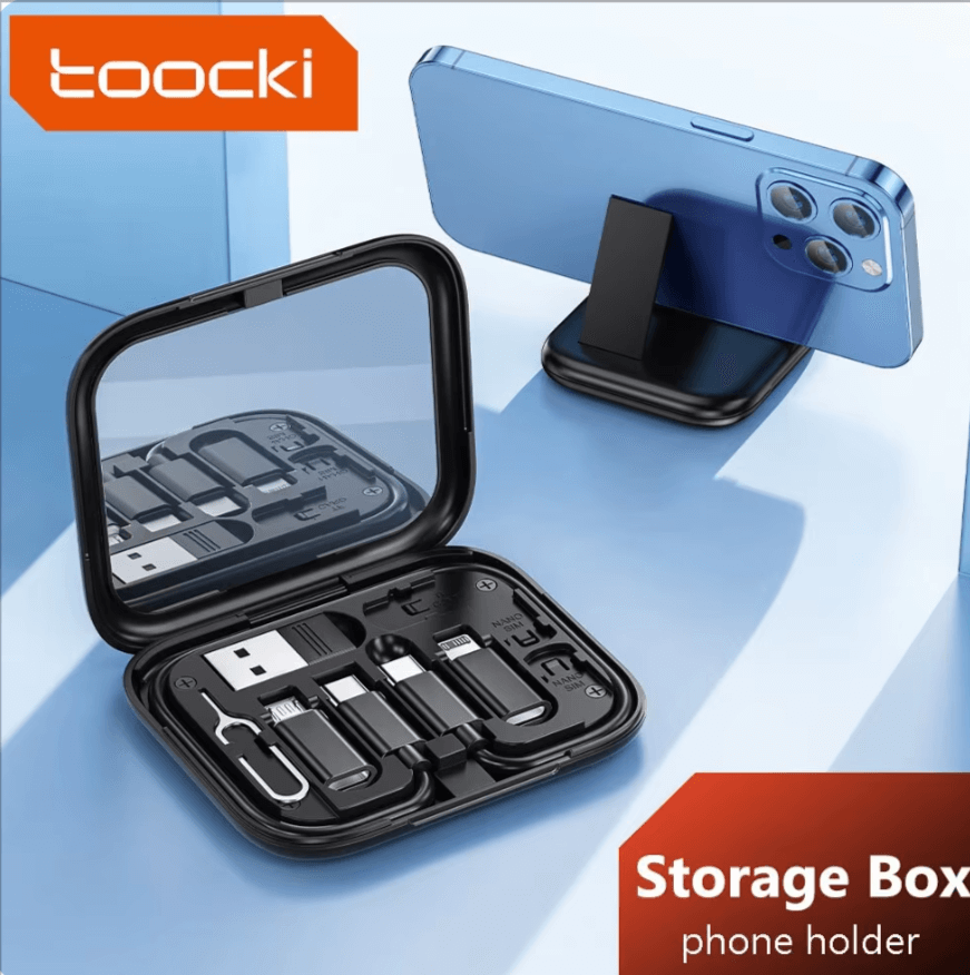 A black Toocki USB cable storage box with multiple connectors, displayed next to a smartphone, showing its function as a phone holder and storage box.