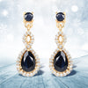 Pendientes de oro amarillo de 14 quilates con zafiro azul auténtico de 1,19 quilates y diamantes blancos