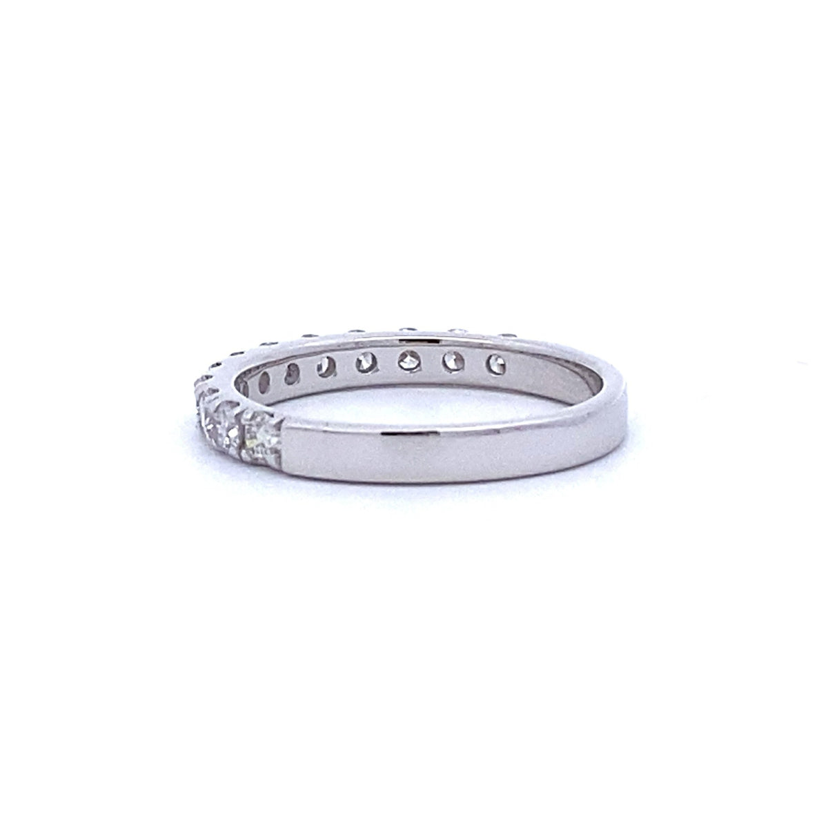Anillo de boda con diamante natural de .75ct en oro blanco de 14kt