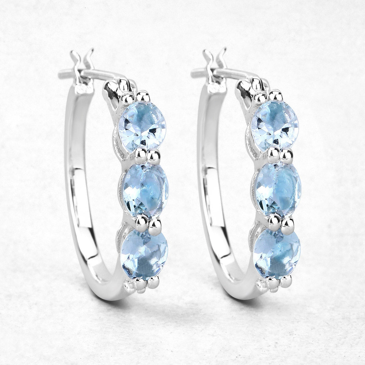 Pendientes de plata de ley .925 con aguamarina auténtica de 1.75 quilates y diamantes blancos