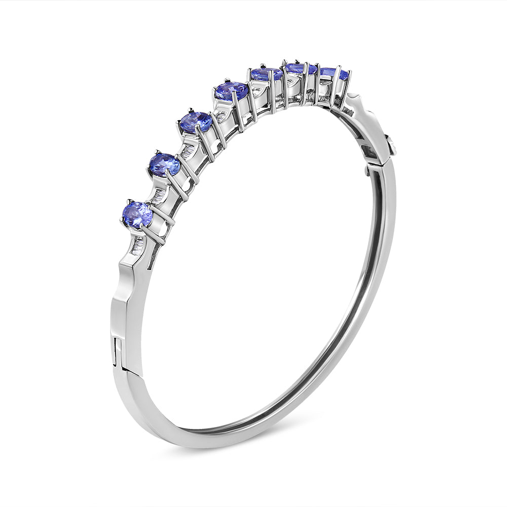 Brazalete de oro blanco de 14 quilates con tanzanita azul ovalada de 5 mm y diamantes de 1/4 Cttw (color H-I, claridad VS2-SI1) - Se ajusta a muñecas de hasta 7 1/2 pulgadas