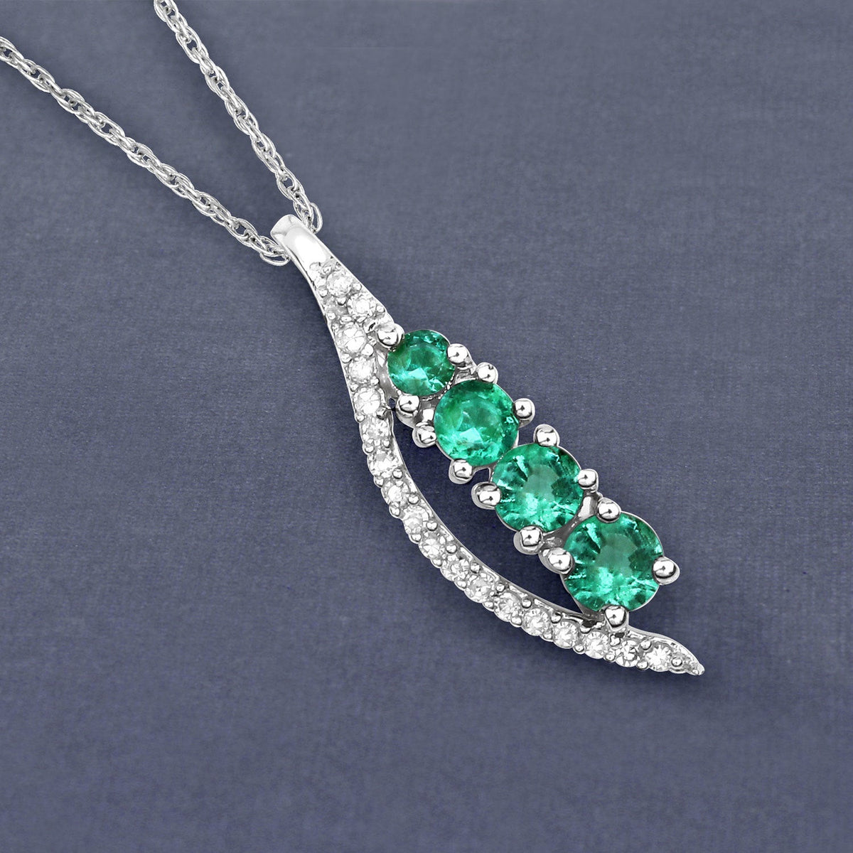 Colgante de oro blanco de 14 quilates con esmeralda zambiana auténtica de 0,34 quilates y diamantes blancos