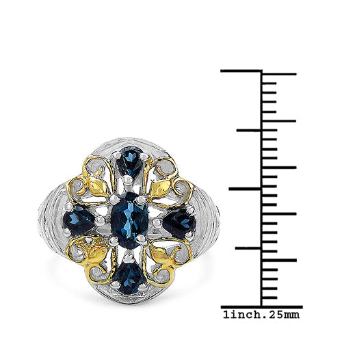 Anillo de plata de ley .925 con topacio azul de Londres genuino de 1.45 quilates, chapado en dos tonos