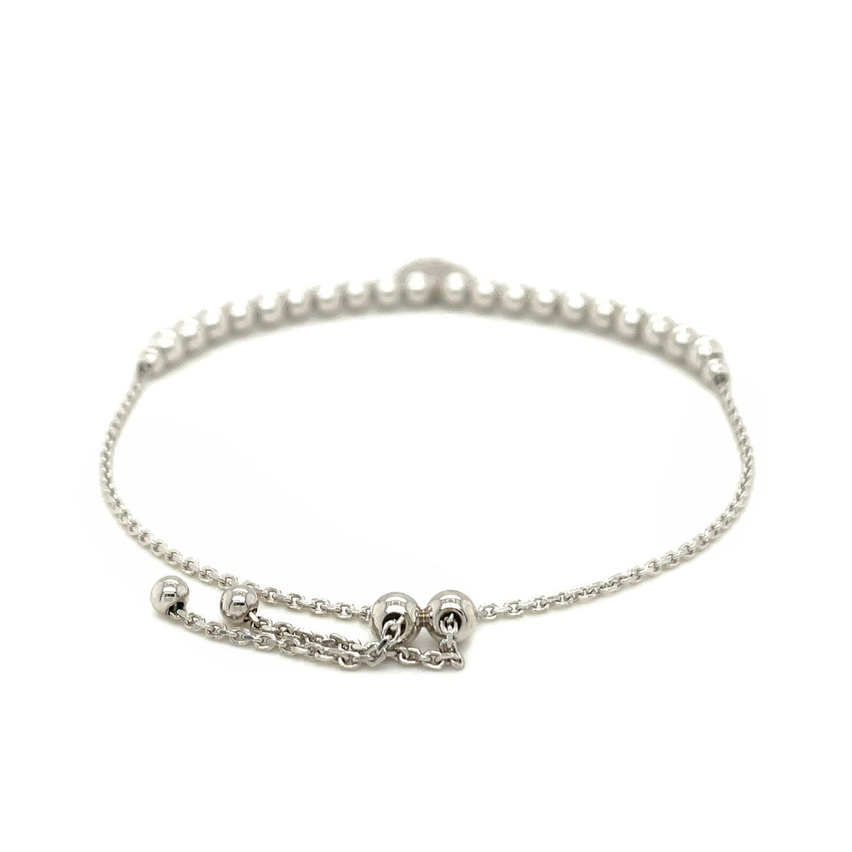 Pulsera de cuentas ajustable con dije redondo y circonitas cúbicas en plata de ley