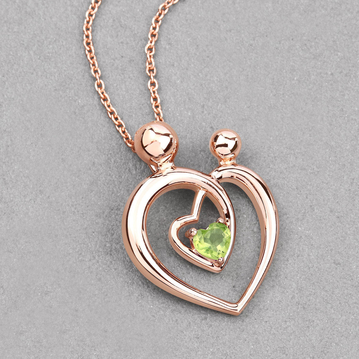 Colgante de plata de ley .925 con peridoto genuino de 0,25 quilates