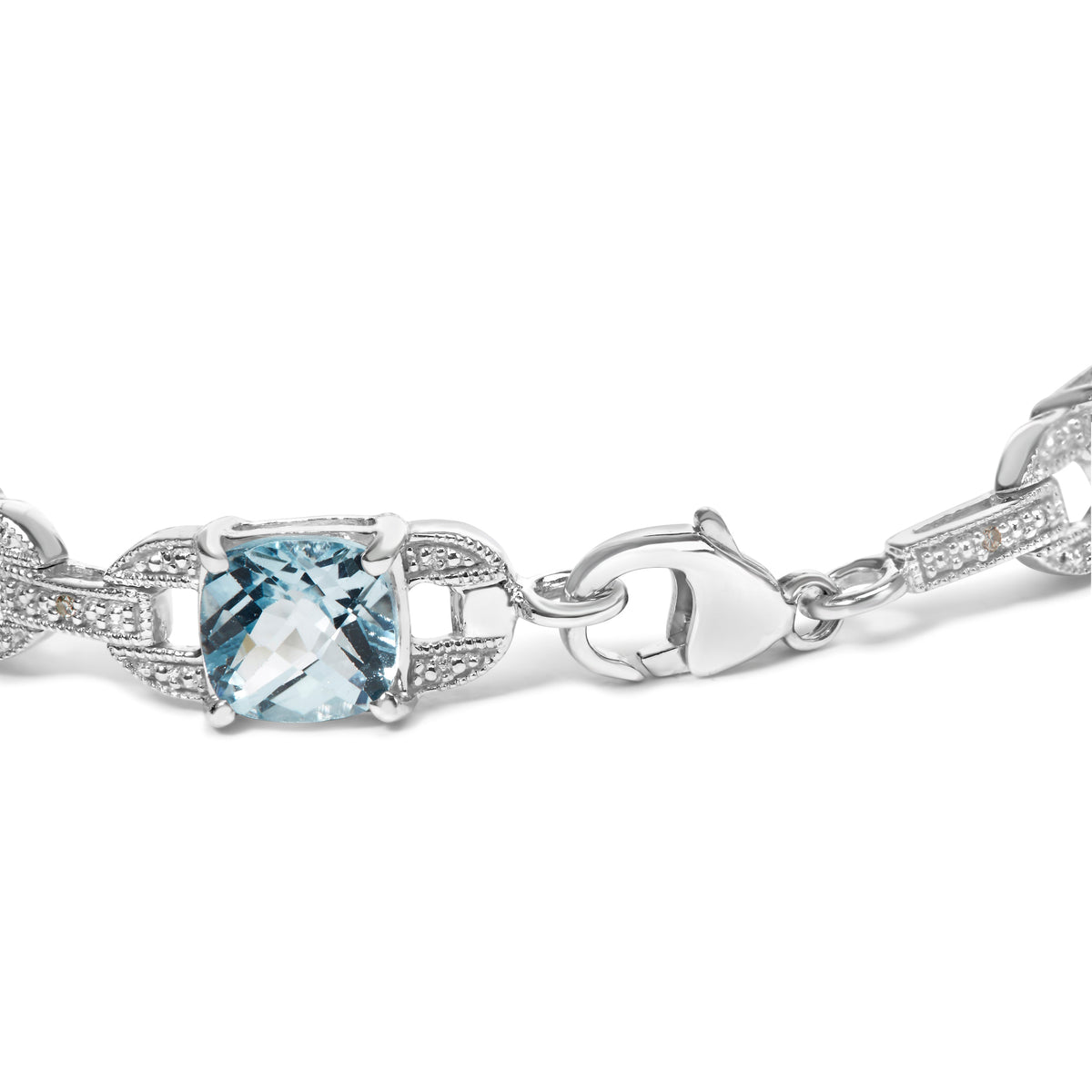 Pulsera de tenis de moda de plata de ley .925 con topacio azul de talla cojín de 7x7 mm y diamantes redondos de 1/20 quilates (Color I-J, Claridad I1-I2) - 7"