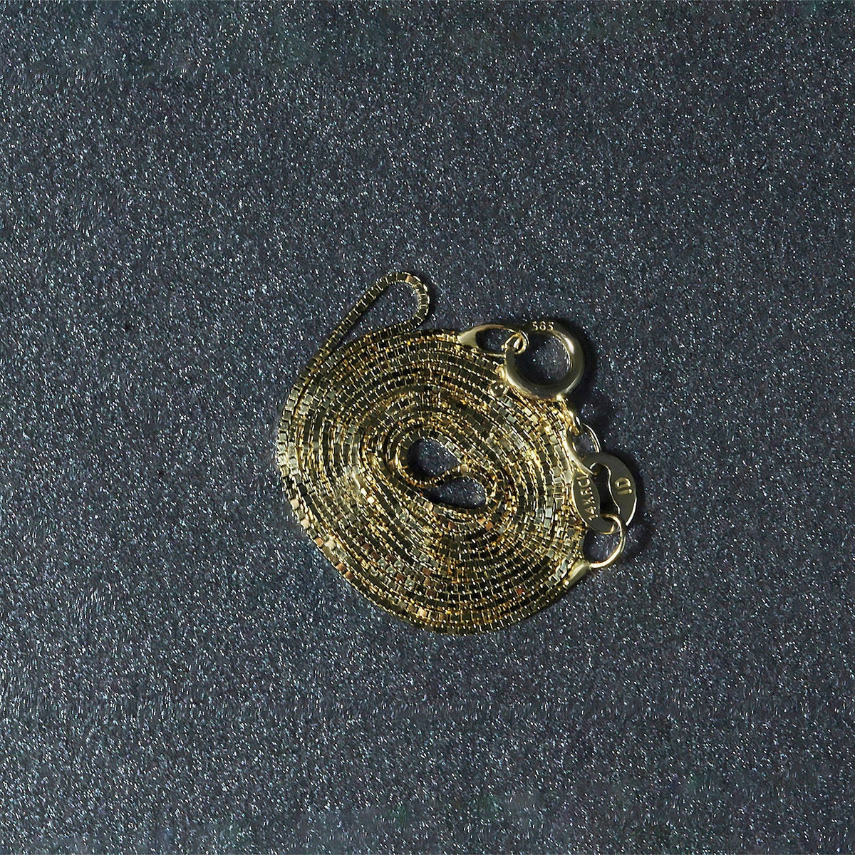 Cadena clásica de oro amarillo de 14k y 0.6mm