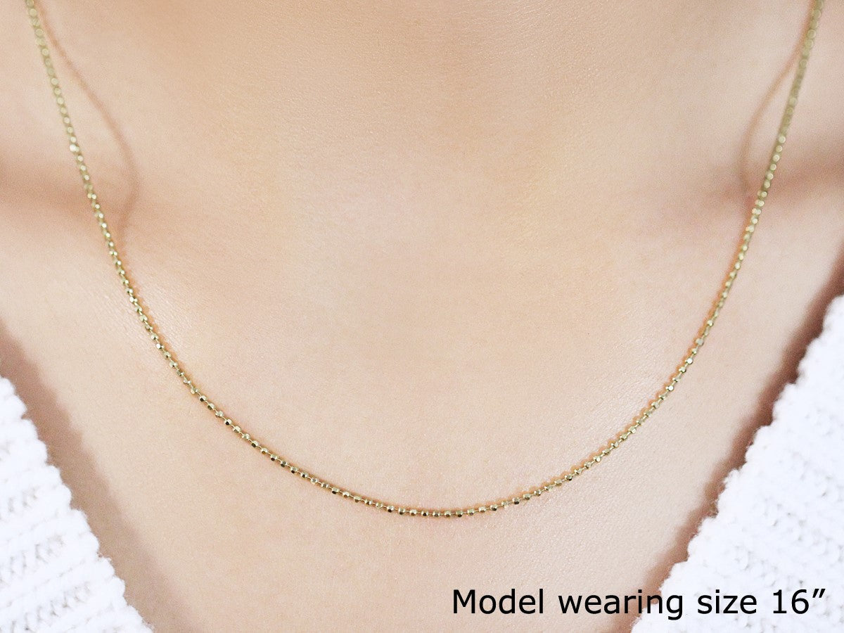 Cadena de Oro Amarillo de 14k con Cuentas Talladas de 1.2mm