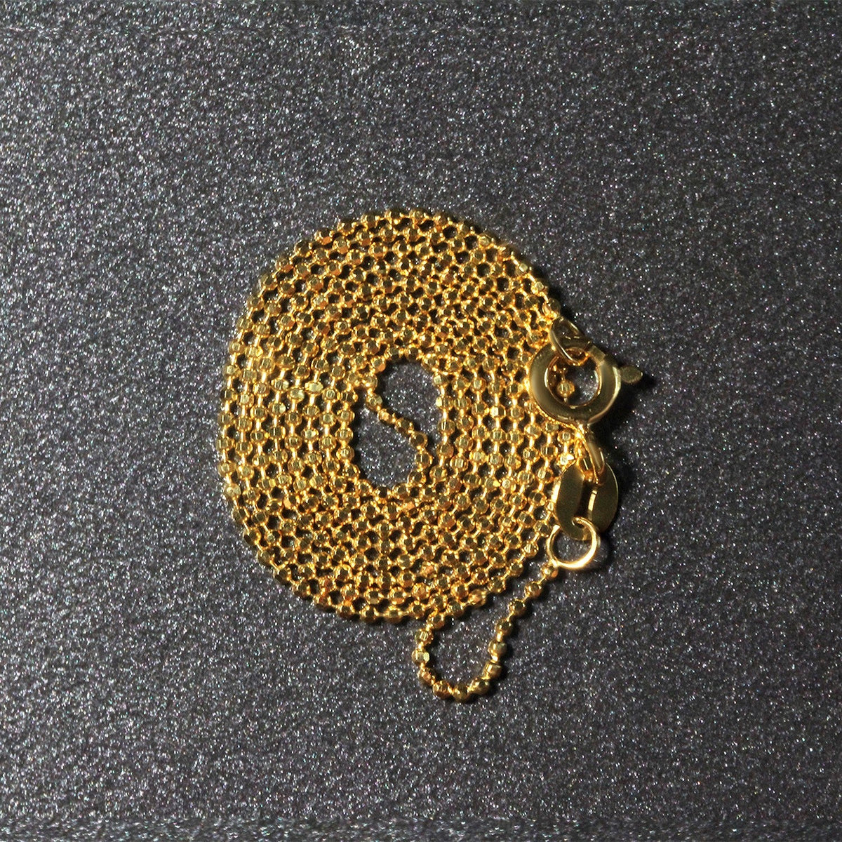 Cadena de oro amarillo de 14k de 1.0mm con cuentas facetadas