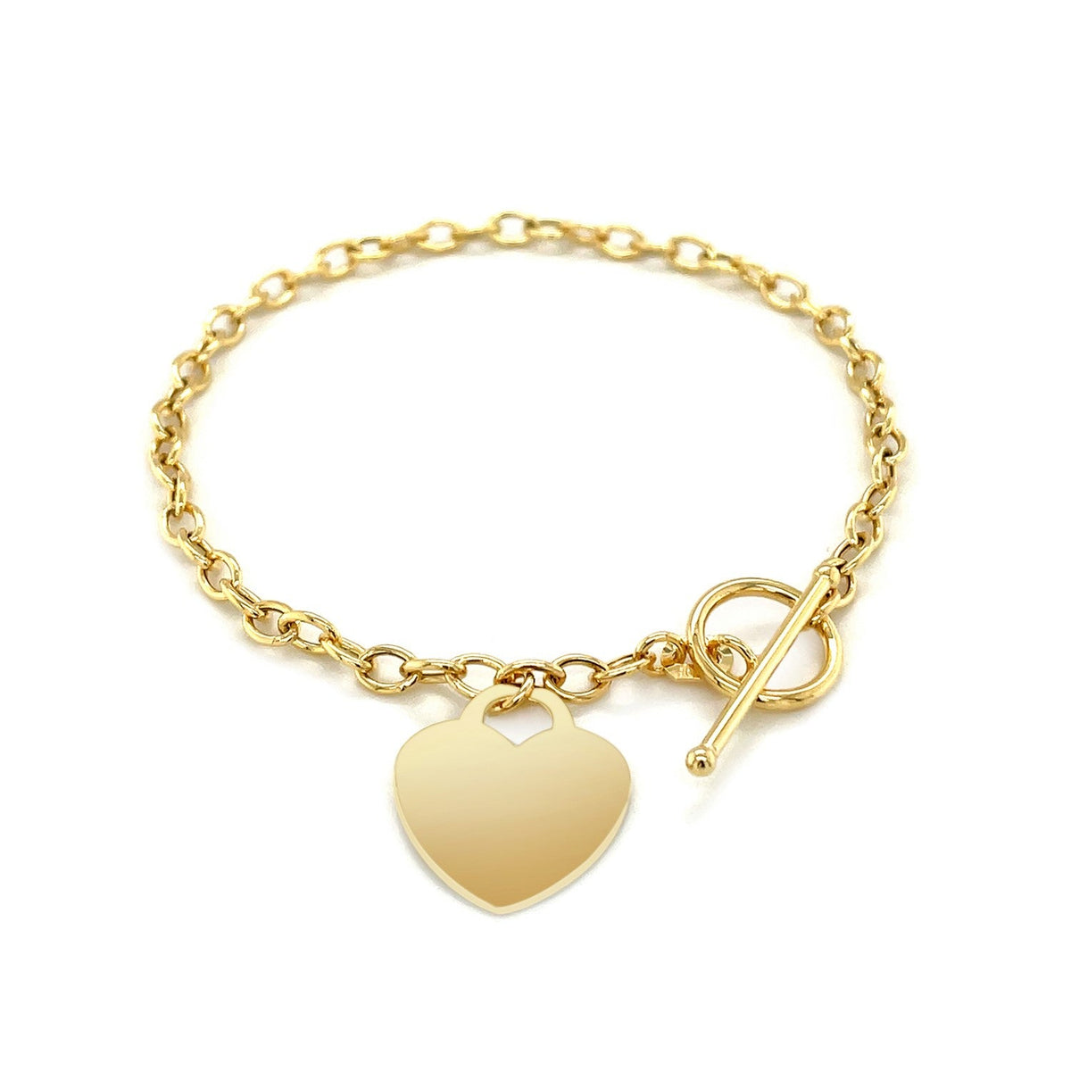 Pulsera de eslabones con cierre de palanca y dije de corazón en oro amarillo de 14k