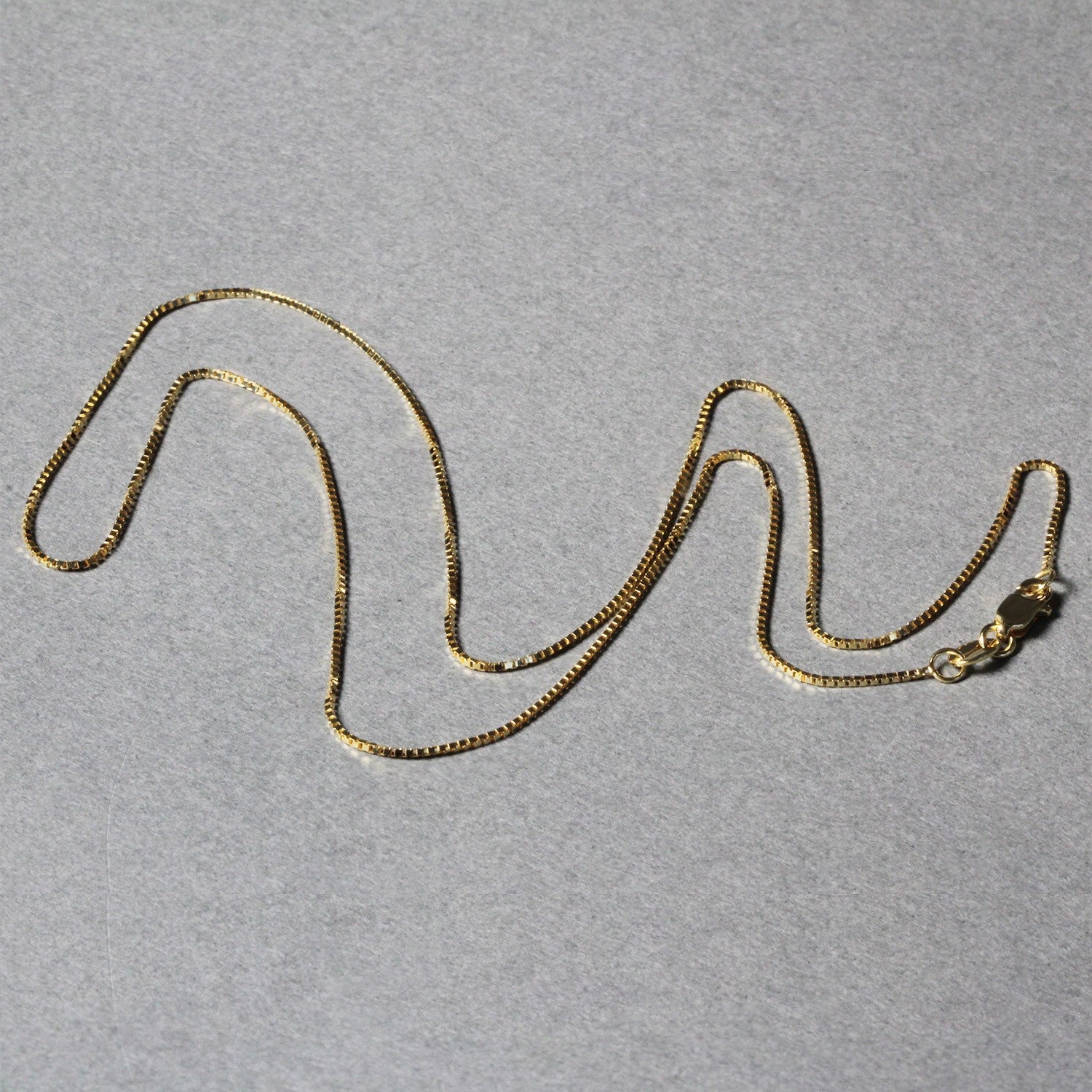 Cadena clásica de oro amarillo de 14k de 0.7mm