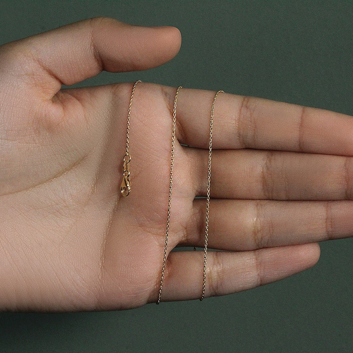 Cadena de eslabones ovalados de oro amarillo de 10k (0,97 mm)