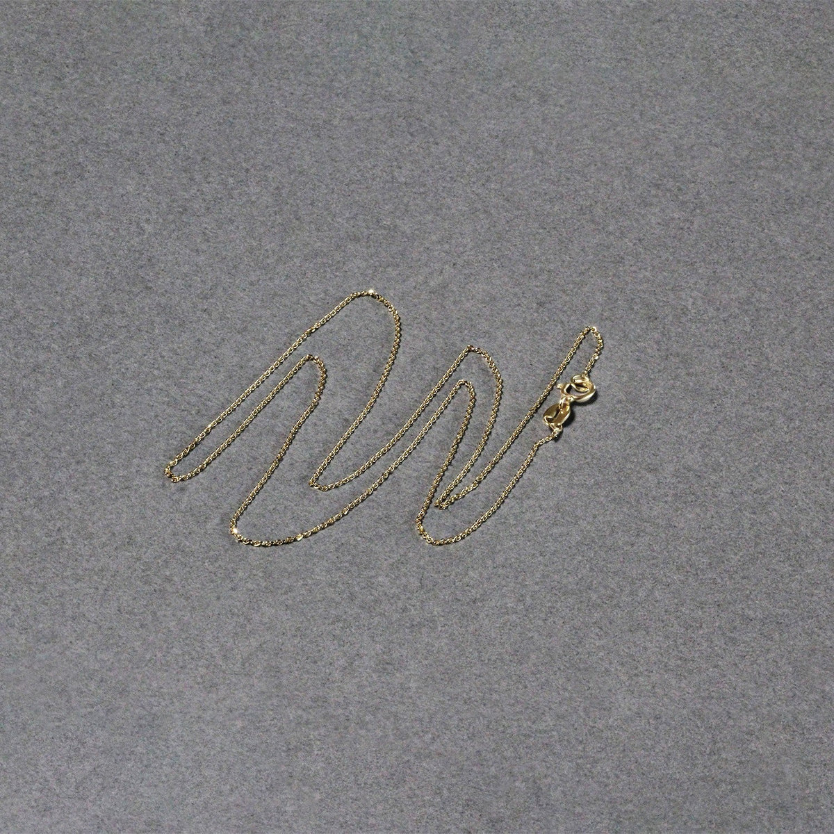 Cadena de eslabones tipo cable con corte de diamante de oro amarillo de 14k y 0,7 mm