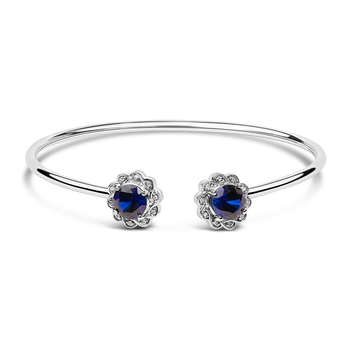 Brazalete de plata de ley con acento de diamante, zafiro azul creado y diseño floral