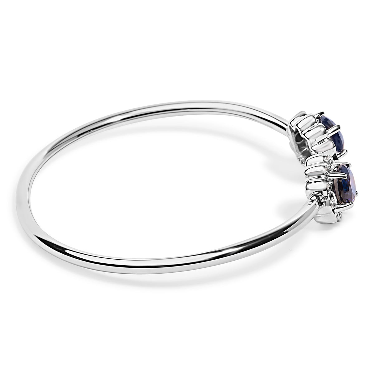 Brazalete de plata de ley con acento de diamante, zafiro azul creado y diseño floral