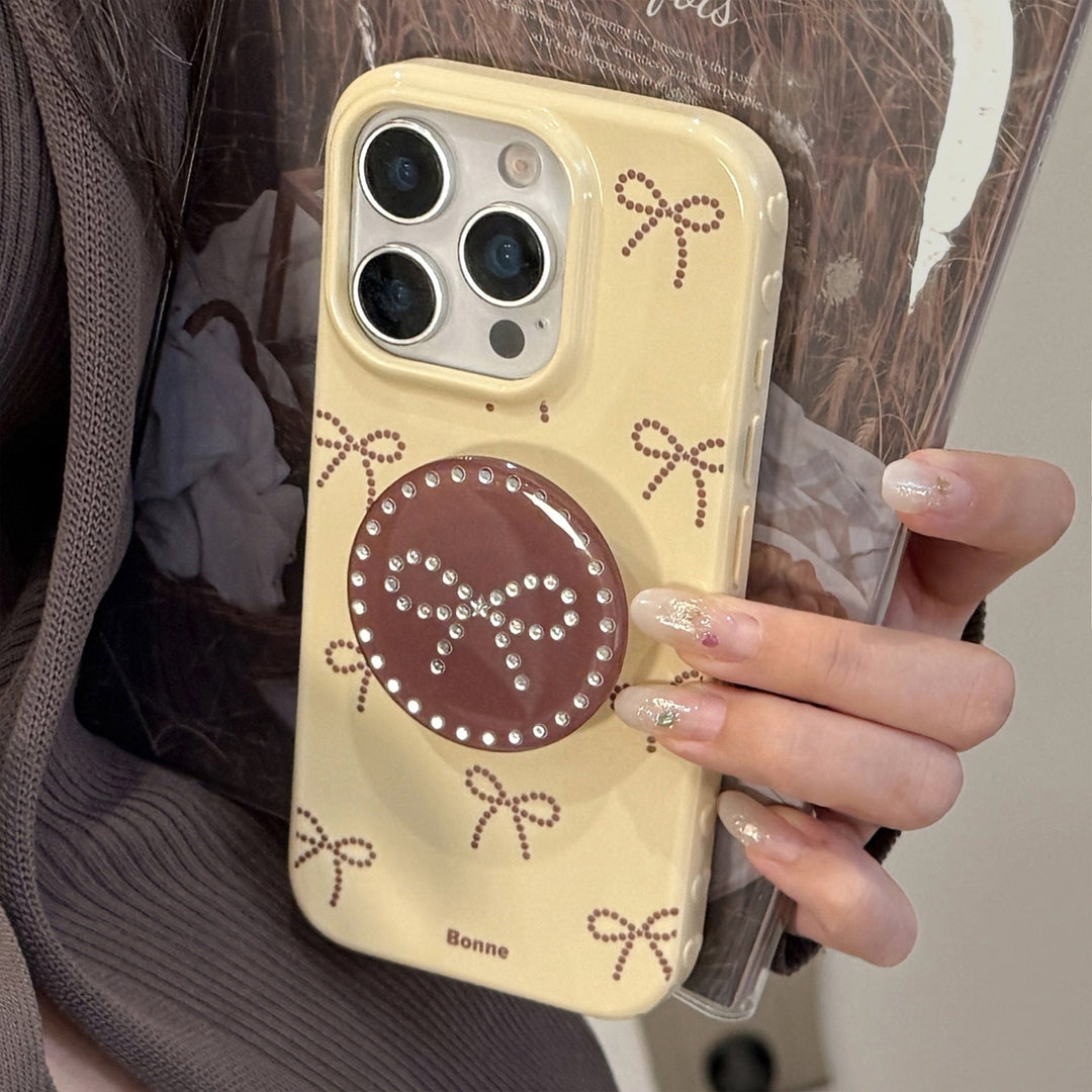 Gilt polka dot bow holder Apple 17 mobile phone case iphone16promax is suitable for 14 personalities 16 all-inclusive.