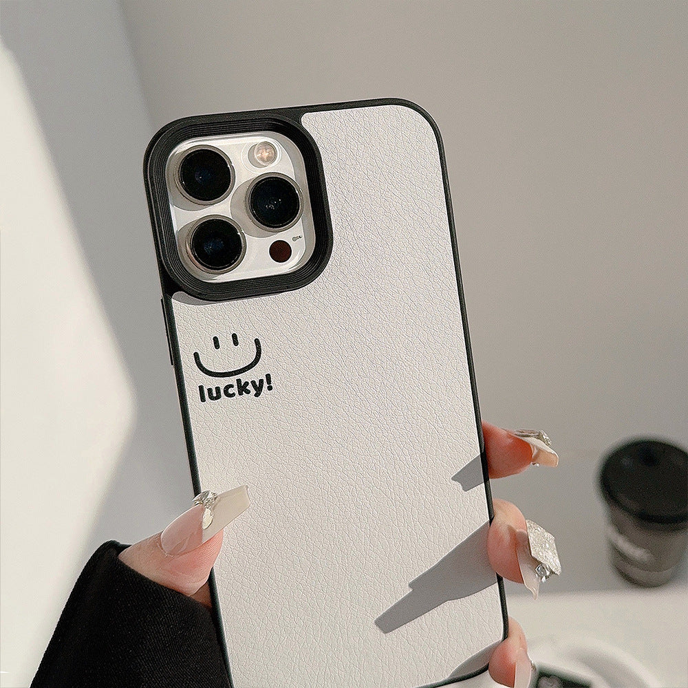 Funda de teléfono móvil Apple con cara sonriente ins 17pro max piel de cordero 11 adecuada para iPhone16, personalidad sencilla 15 anticaída.
