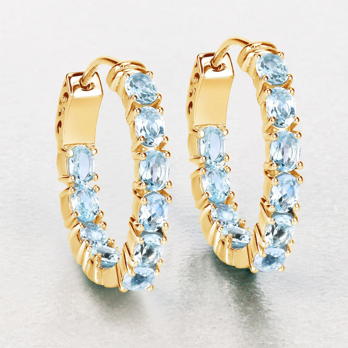 Pendientes de plata de ley .925 con topacio azul genuino de 3.80 quilates