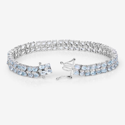 Pulsera de plata de ley .925 con topacio azul auténtico de 17.22 quilates y diamantes blancos