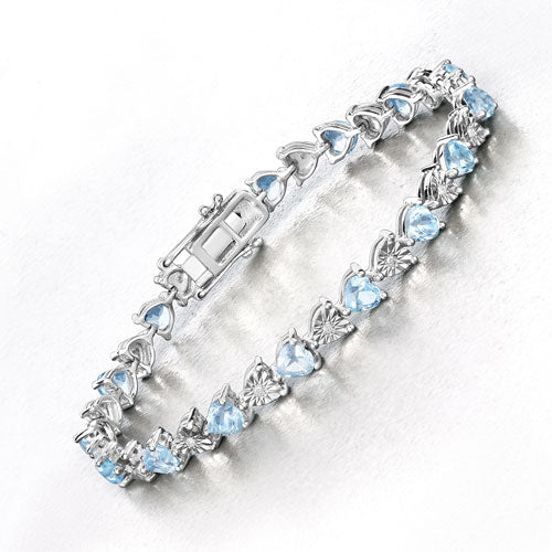 Pulsera de plata de ley .925 con topacio azul genuino de 7,64 quilates y diamantes blancos