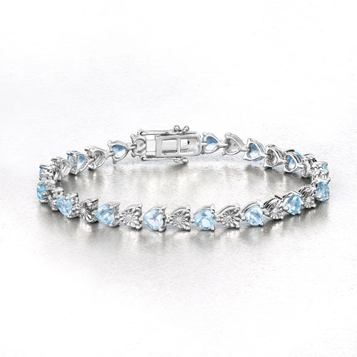 Pulsera de plata de ley .925 con topacio azul genuino de 7,64 quilates y diamantes blancos