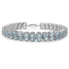 Brazalete de plata esterlina .925 con topacio azul auténtico de 18,00 quilates