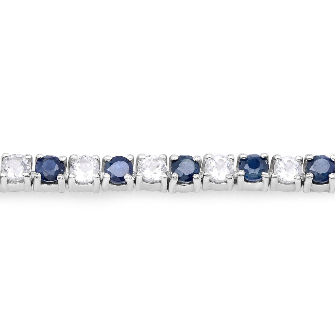 Brazalete de zafiro azul y topacio blanco de 6.87 ct. p.t. en plata de ley