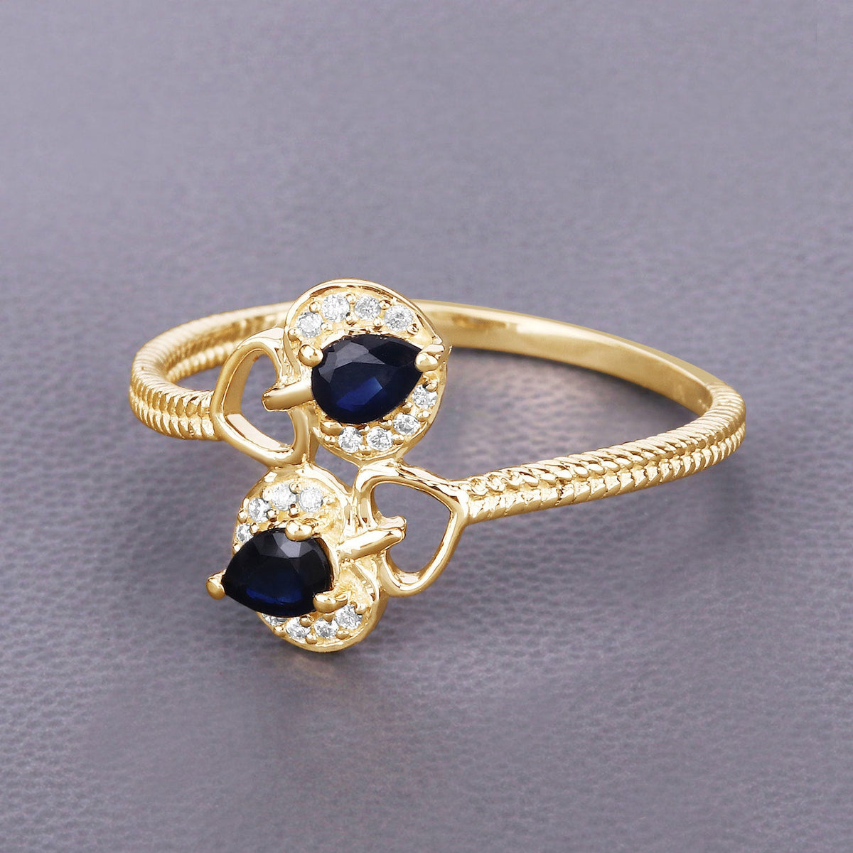 Anillo de oro amarillo de 14 quilates con zafiro azul auténtico de 0,34 quilates y diamantes blancos