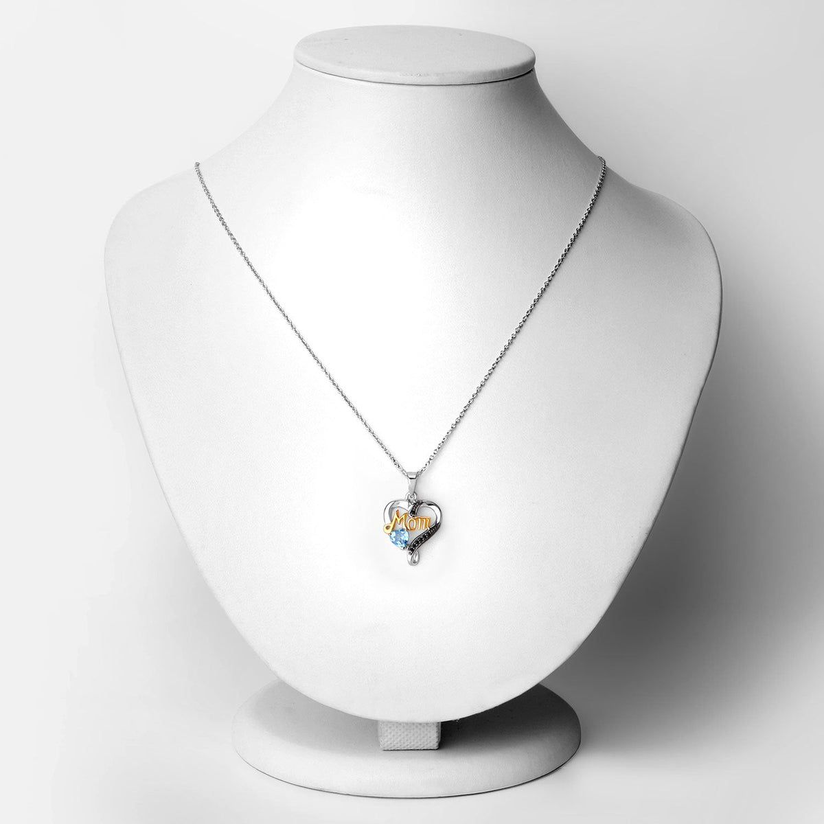 Colgante de plata de ley .925 con topacio azul suizo y espinela negra genuinos de 0,57 quilates