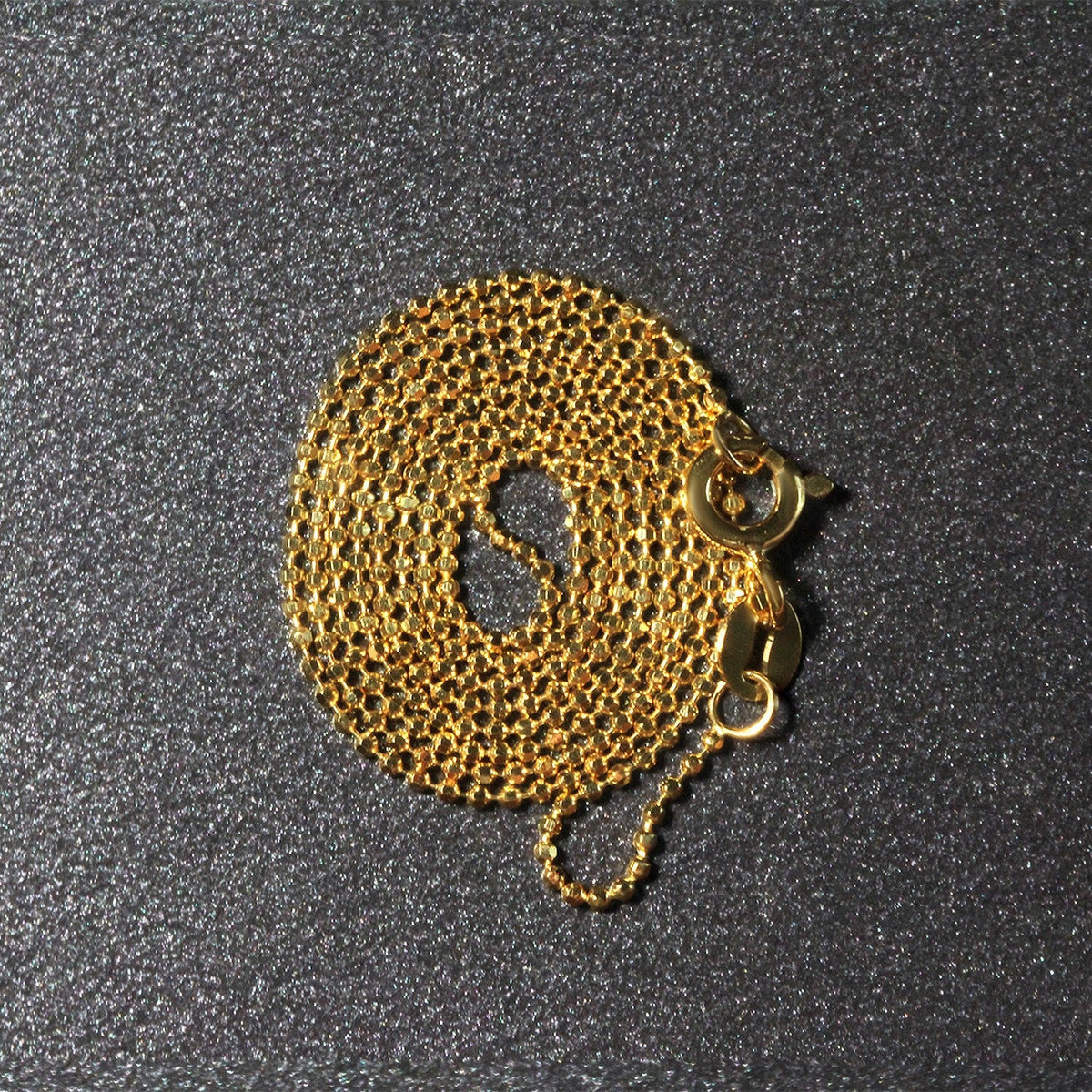 Cadena de oro amarillo de 14k de 1.0mm con cuentas facetadas