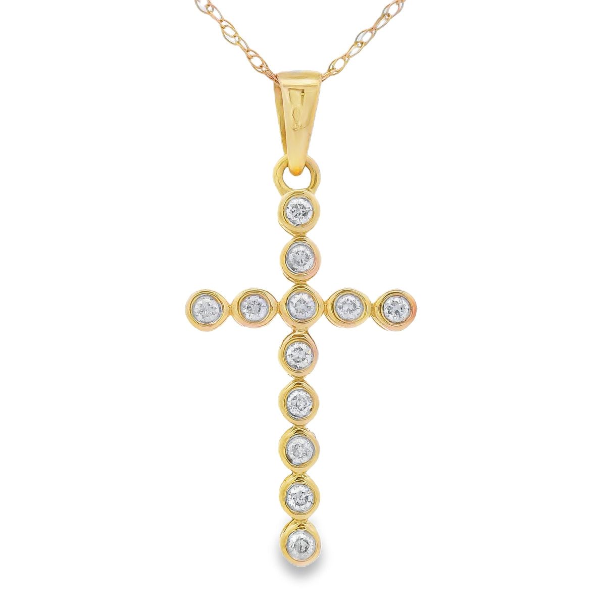 Colgante religioso de cruz con diamante de .12ct en oro amarillo de 14K