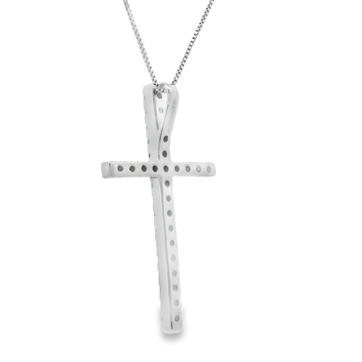 Colgante de cruz religiosa con diamante de .38 ct en oro blanco de 14 K