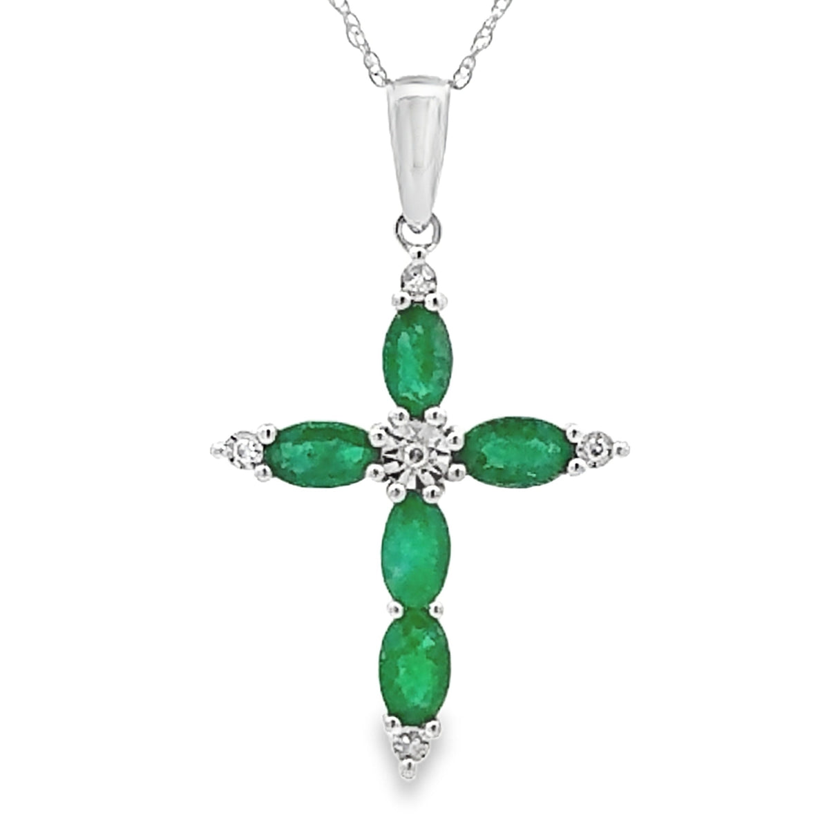 Colgante religioso de cruz con diamante esmeralda en oro blanco de 10 quilates