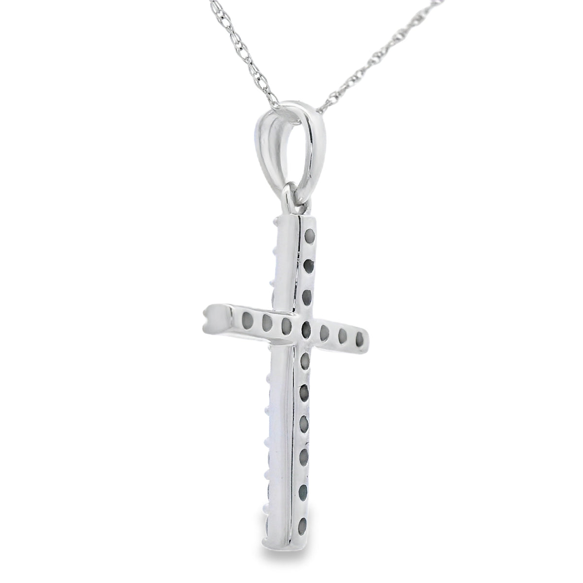 Colgante religioso de cruz con diamante de 0,30 qt en oro blanco de 14 kt