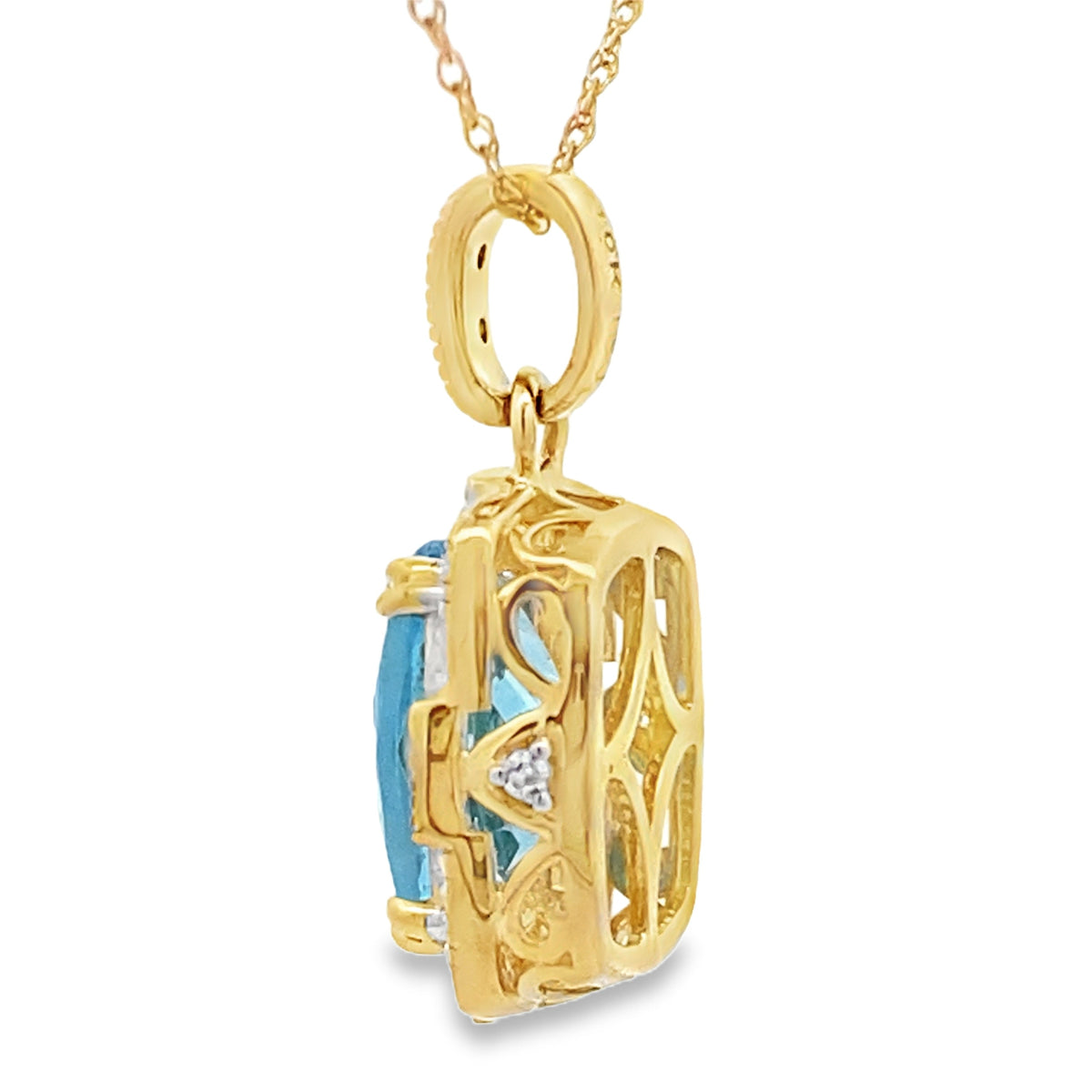 Colgantes de moda de topacio azul y diamantes en oro amarillo de 10 qt