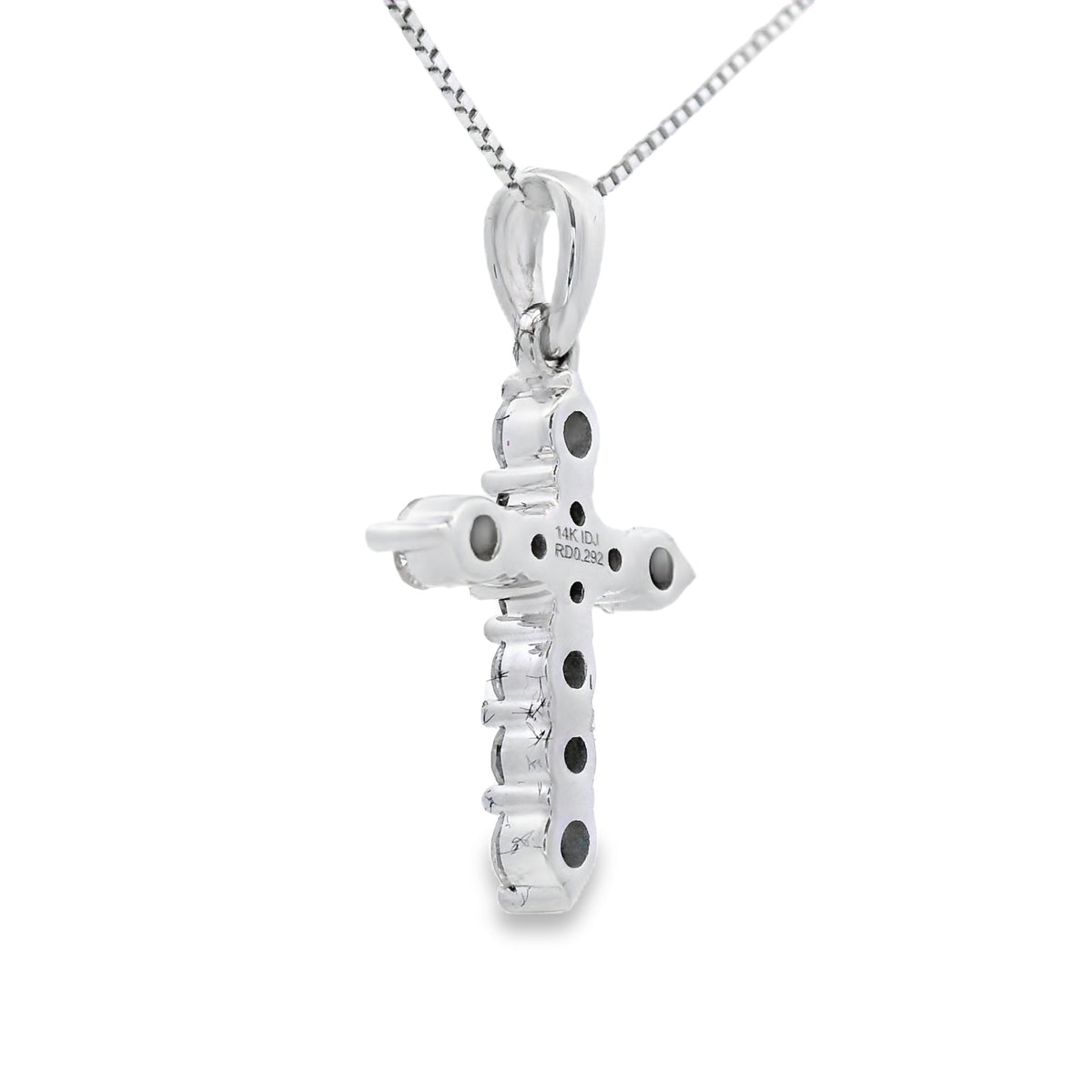 Colgante religioso de cruz con diamante de 0,30 qt en oro blanco de 14 kt