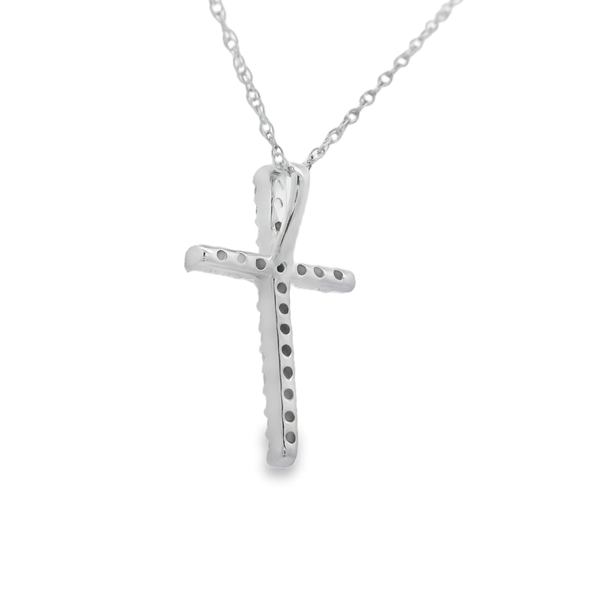 Colgante de cruz religiosa con diamante de 0,10 ct en oro blanco de 14 kt