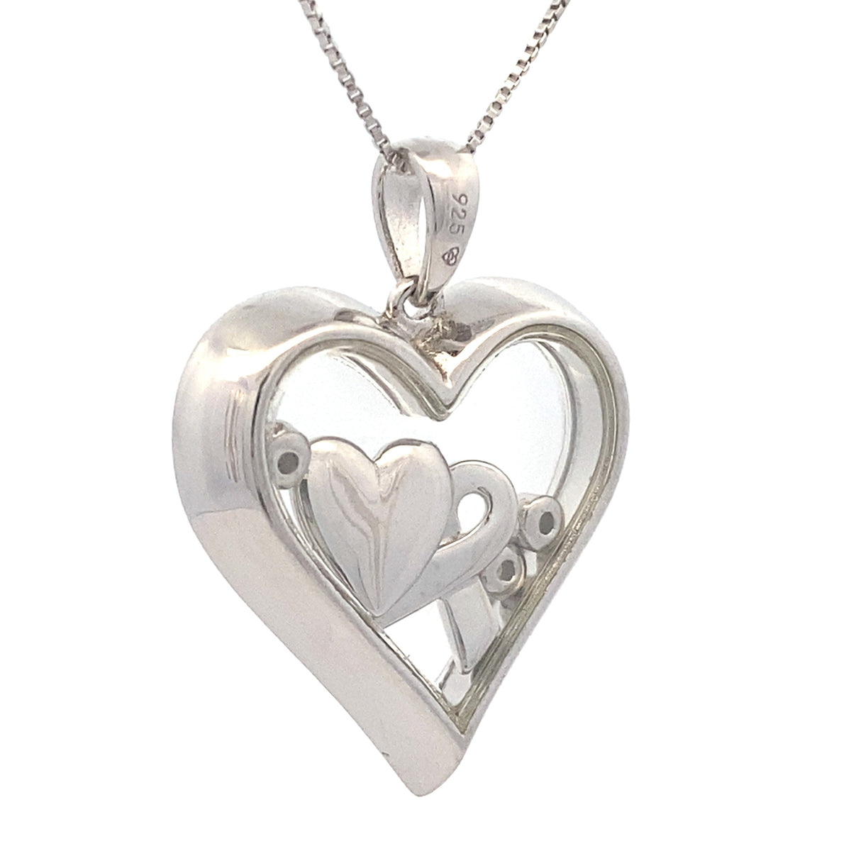 Colgante de corazón de diamantes de .02 ct y plata esterlina