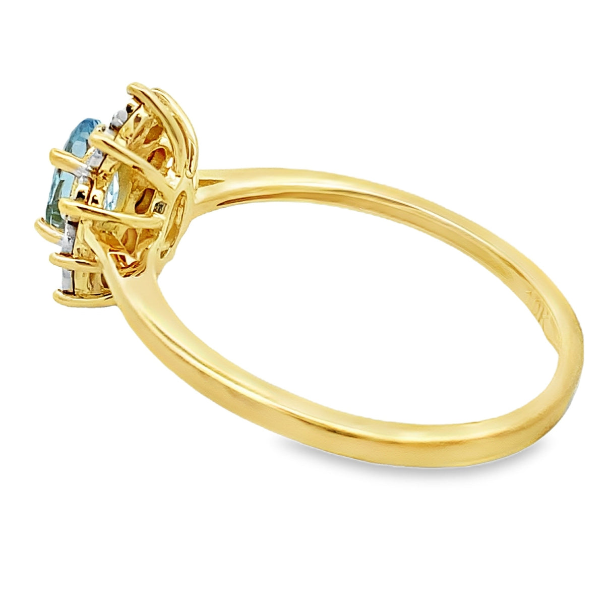 Auténtico anillo de aguamarina y diamantes de .43 ct en oro amarillo de 10 kt