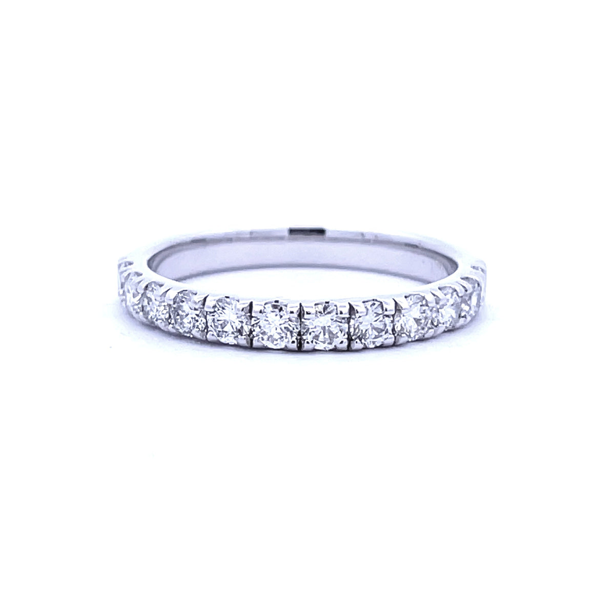 Anillo de boda con diamante natural de .75ct en oro blanco de 14kt