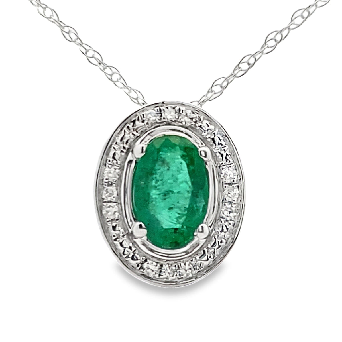 Colgantes de moda con diamante esmeralda de .46ct, oro blanco de 10K