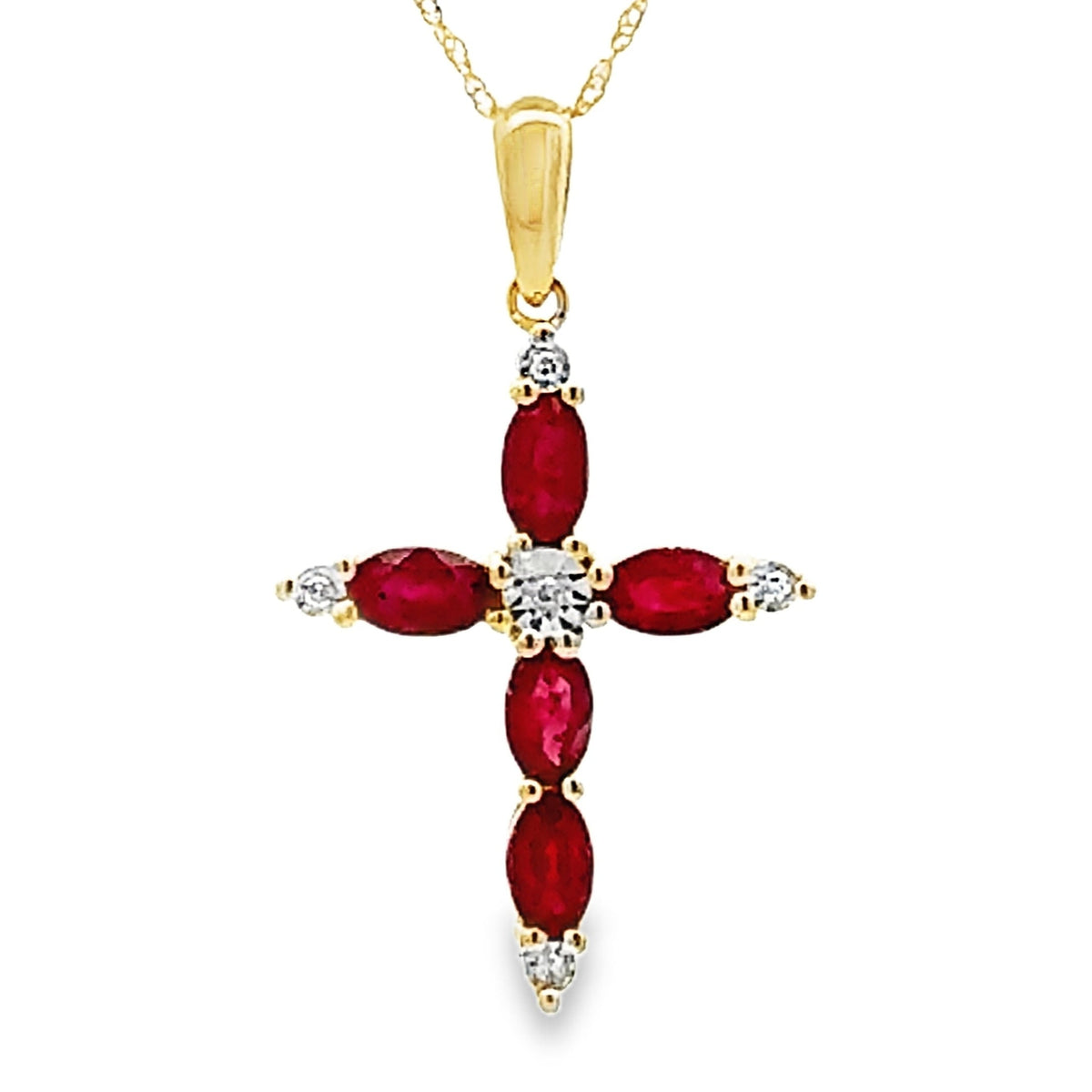 Colgante religioso de cruz con rubí y diamante en oro amarillo de 10 quilates