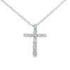 Colgante religioso de cruz con diamante de .12qt de oro blanco de 10kt