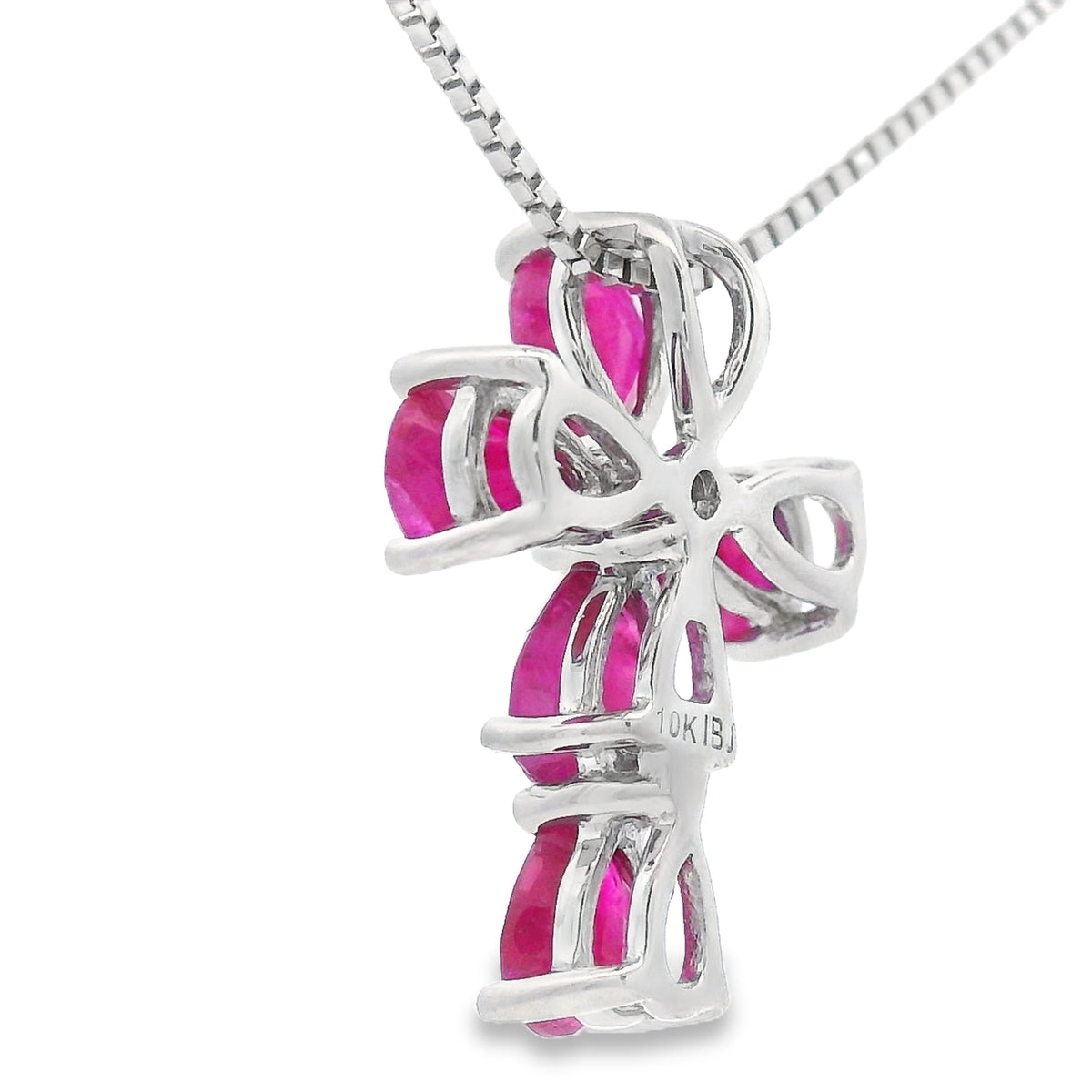 Colgante religioso de cruz con rubíes y diamantes de oro blanco de 10 quilates