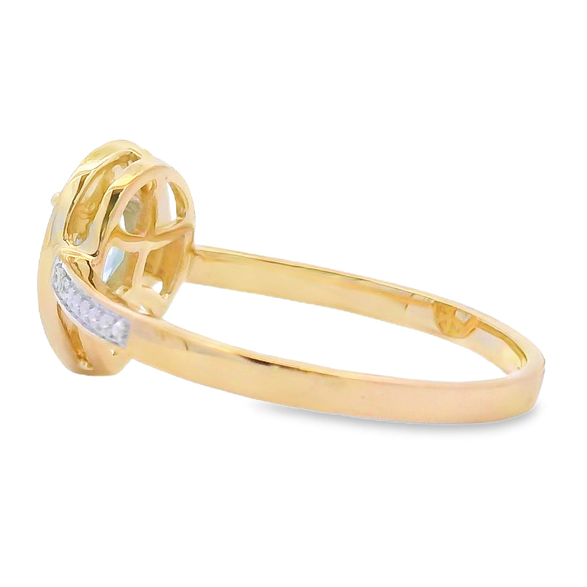 Anillo genuino de aguamarina de .39ct con diamante en oro amarillo de 10KT